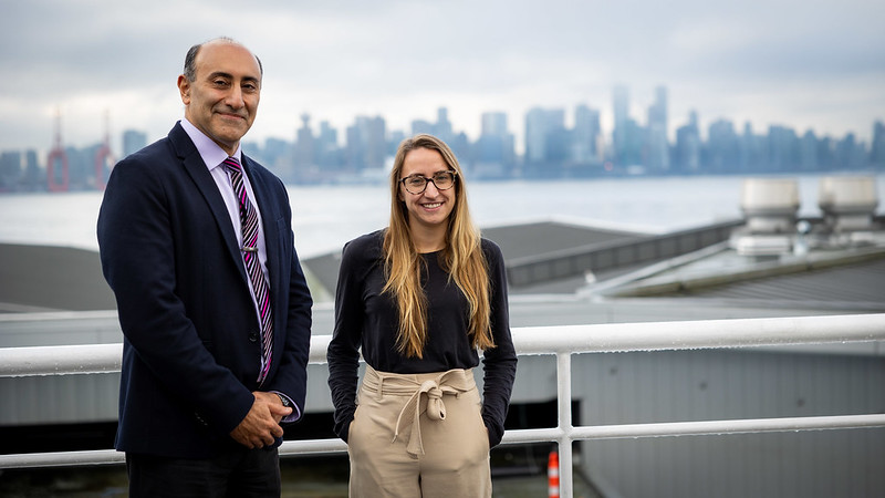 Man and woman smiling next to Harbour.